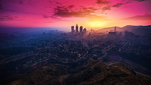 GTA V Los Santos Cityscape at Sunset with Vibrant Pink Sky and Distant Skyscrapers HD wallpaper