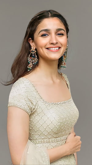 Alia Bhatt in an elegant cream scalloped dress with ornate statement earrings HD phone wallpaper