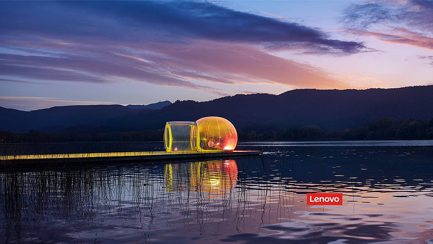 Lenovo branded glass bubble house on a lake at dusk with mountain silhouettes HD wallpaper