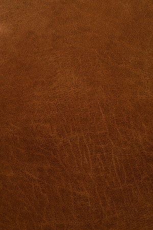 Rich Brown Leather Texture Surface with Natural Grain and Subtle Creases HD phone wallpaper