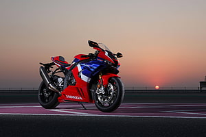 Honda CBR1000RR-R Fireblade Superbike on a Race Track at Sunset HD wallpaper