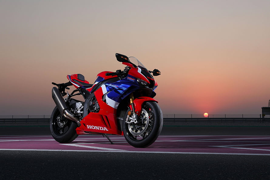 Honda CBR1000RR-R Fireblade Superbike on a Race Track at Sunset HD wallpaper