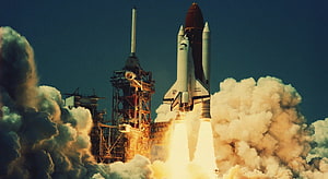 Space Shuttle Challenger Launching From Launch Pad With Billowing Smoke And Fire HD wallpaper