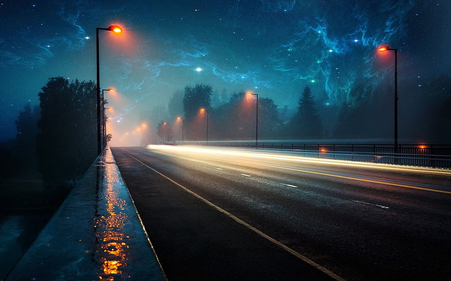 Moody Night Highway With Long Exposure Light Trails Under a Starry Sky HD wallpaper