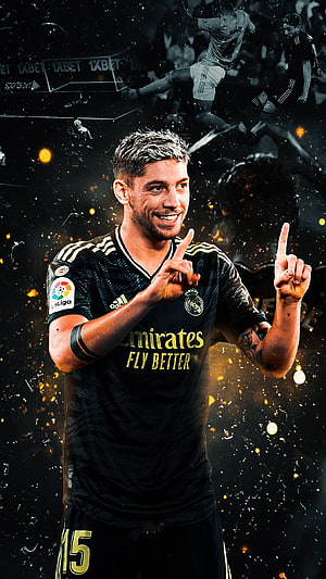 Fede Valverde in Real Madrid Black Away Kit with Gold Accents and La Liga Badge HD phone wallpaper
