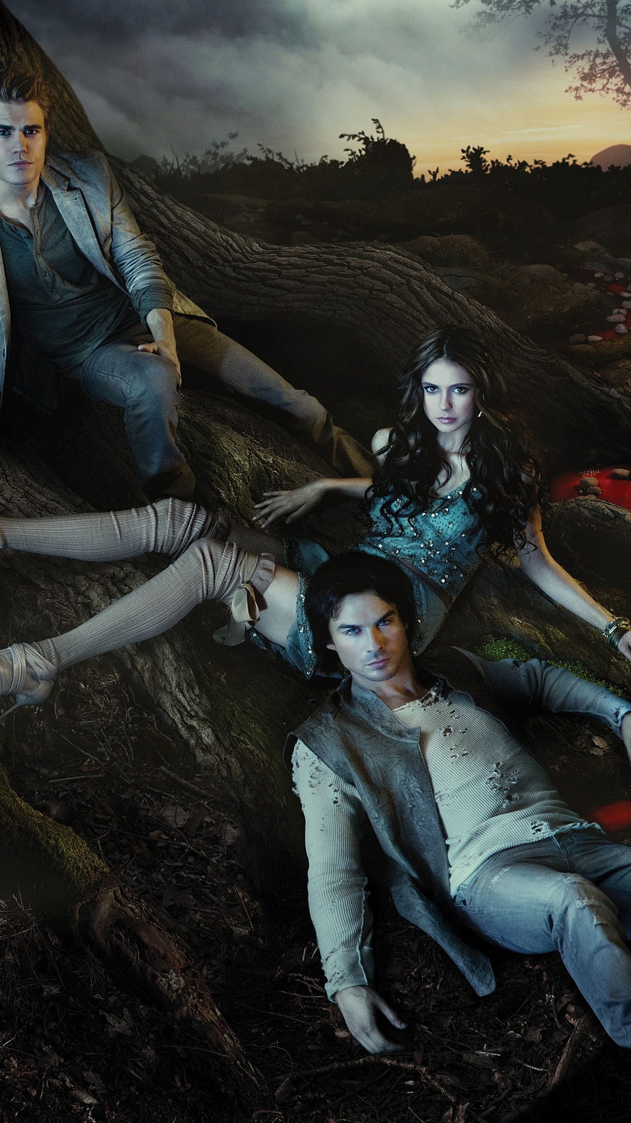 The Vampire Diaries Cast Reclining on Tree Roots at Dusk HD phone wallpaper