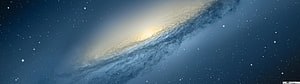 Spiral Galaxy with Bright Core and Dust Lanes in Deep Space HD wallpaper