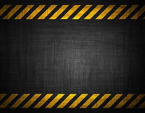 Industrial Hazard Stripes on Dark Textured Metal Surface HD wallpaper