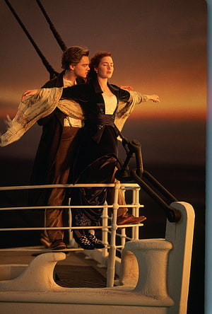 Jack and Rose Embracing on the Bow of the Titanic at Sunset HD phone wallpaper