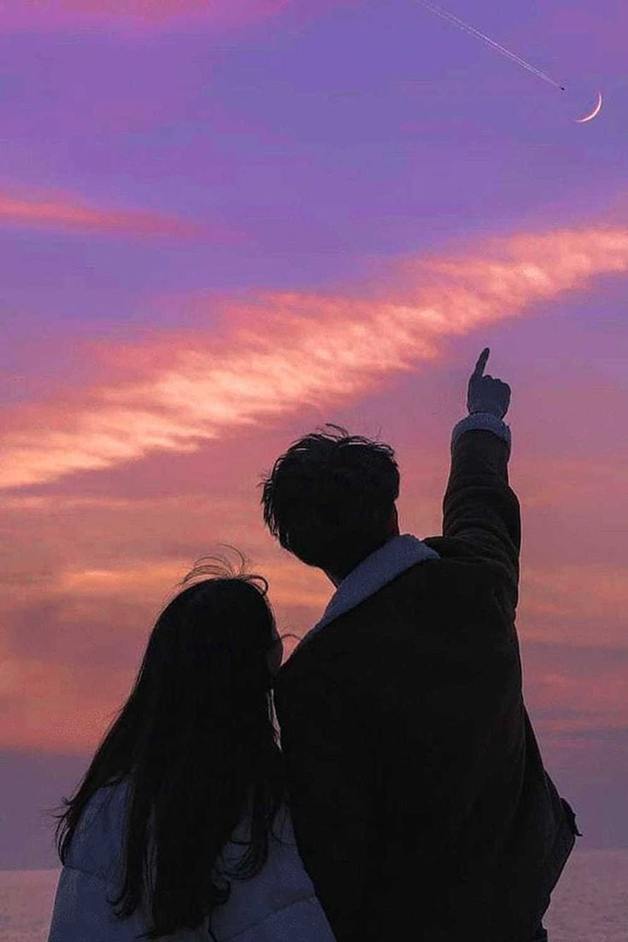 Silhouetted couple pointing at a crescent moon and shooting star against a purple sunset sky HD phone wallpaper