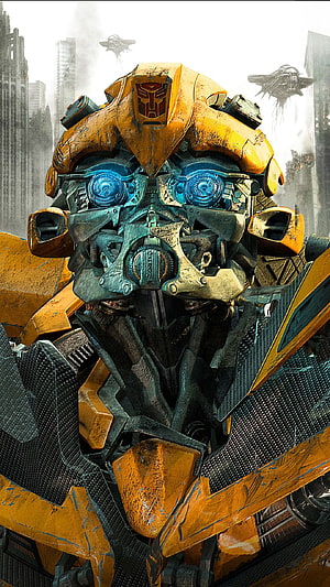 Bumblebee Transformers Autobot Close-Up Portrait with Glowing Blue Eyes and Battle Damage HD phone wallpaper