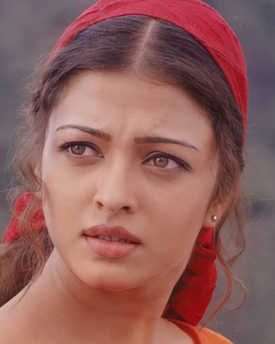 Aishwarya Rai Close-Up Portrait Wearing a Red Headscarf with a Serious Expression HD phone wallpaper