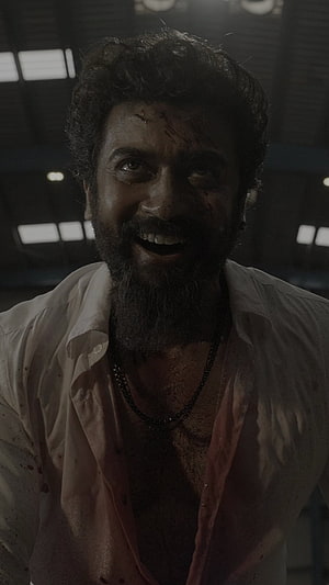 Surya Intense Villain Portrait in Dark Cinematic Setting HD phone wallpaper