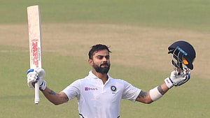 Virat Kohli Celebrating a Test Century in Indian Cricket Kit HD wallpaper