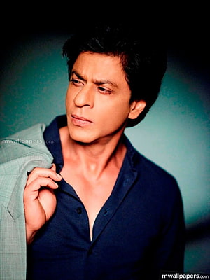 Shah Rukh Khan Studio Portrait in Navy Blue Shirt with Teal Background HD phone wallpaper