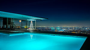 Modern Rooftop Pool With Glowing Christmas Tree Overlooking City Lights At Night HD wallpaper