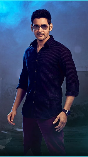 Mahesh Babu in a dark pinstripe shirt and aviator sunglasses against a moody blue backdrop HD phone wallpaper