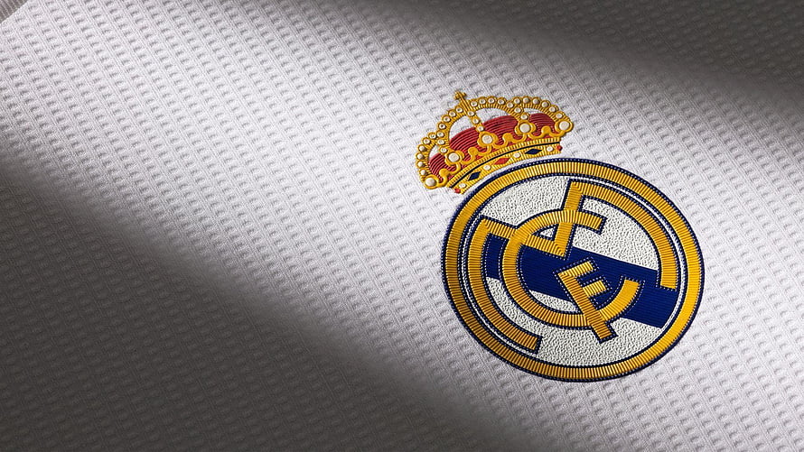 Real Madrid Club Crest Embroidered on White Textured Jersey Fabric HD wallpaper