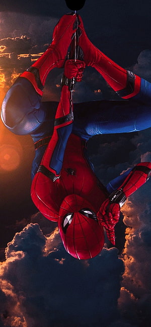 Spider-Man Hanging Upside Down in Dramatic Sunset Clouds HD phone wallpaper
