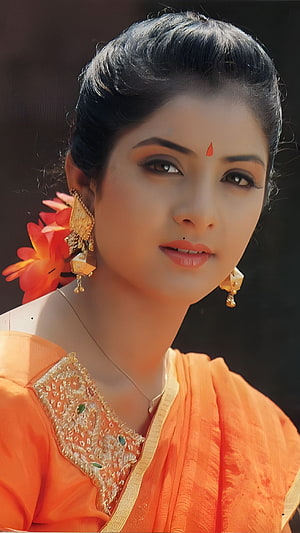 Divya Bharti in Traditional Orange Saree with Gold Jewelry and Floral Hairpiece HD phone wallpaper