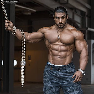 Sangram Chougule Indian Bodybuilder Posing With Chain In Industrial Setting HD phone wallpaper