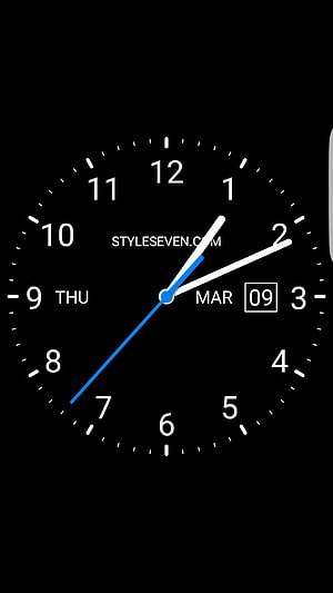 Minimalist Black Analog Clock Face with Blue Second Hand and Date Display HD phone wallpaper