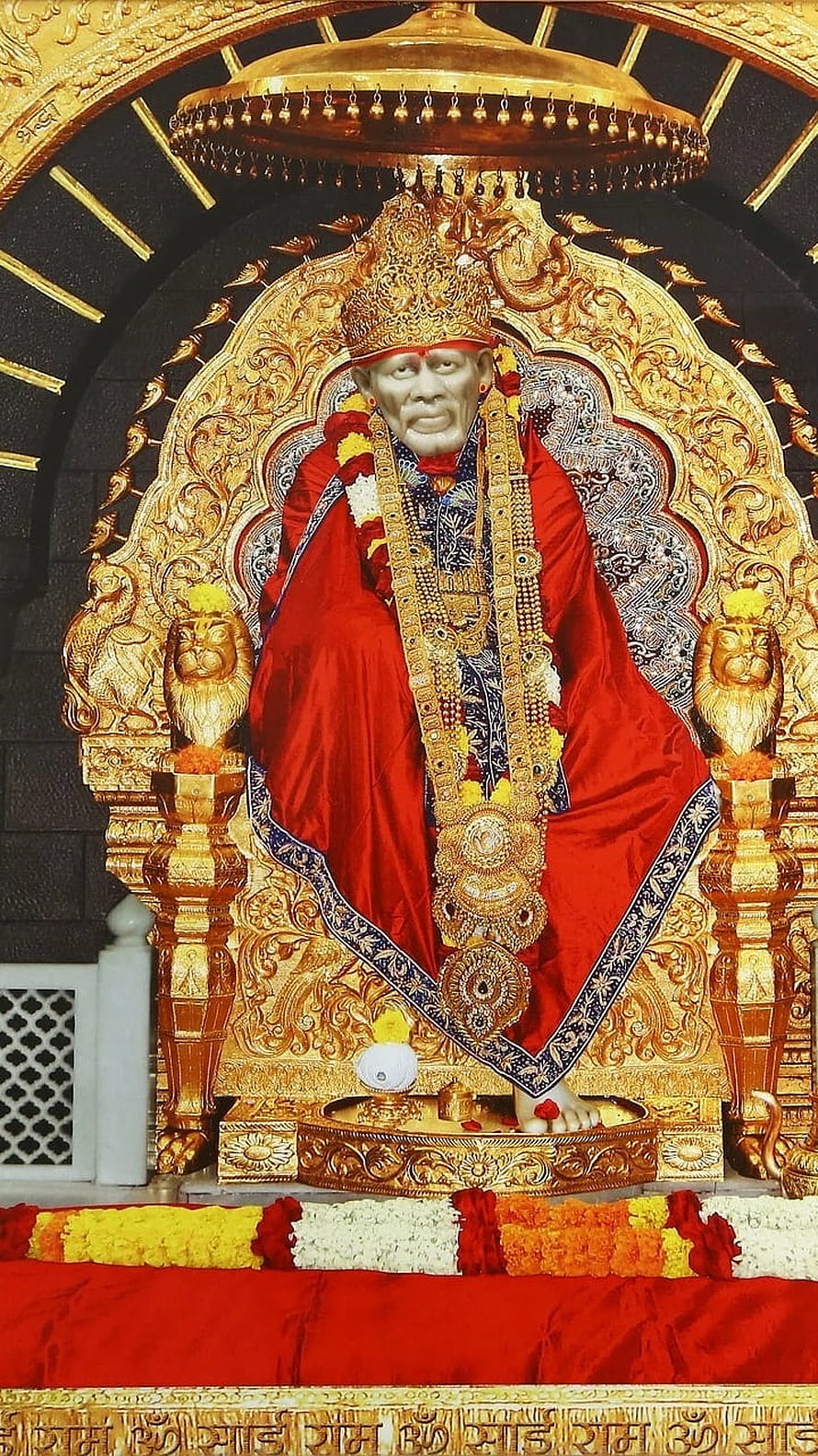 Sai Baba Seated on Ornate Golden Throne in Red Robes and Jewels HD phone wallpaper