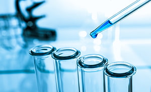 Blue Tinted Laboratory Scene With Glass Test Tubes And Dropper HD wallpaper