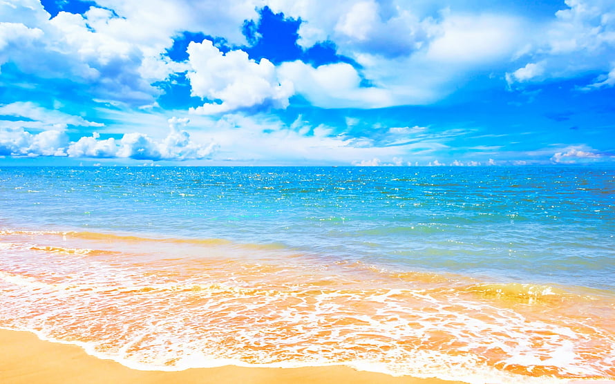 Soothing Tropical Beach Scene With Gentle Waves And Bright Blue Sky HD wallpaper