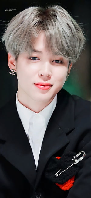 Jimin from BTS in a black suit with silver hair and a red pocket square HD phone wallpaper