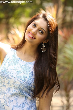 Surabhi in a Blue and White Patterned Top with Traditional Earrings HD phone wallpaper