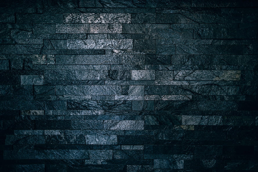 Dark Slate Stone Brick Wall Texture with Ribbed Tile Pattern and Moody Industrial Aesthetic HD wallpaper