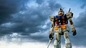 RX-78-2 Gundam Standing Tall Against Dramatic Stormy Sky HD wallpaper