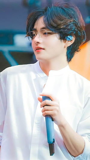BTS Taehyung in White Shirt and Glasses Holding a Blue Microphone on Stage HD phone wallpaper