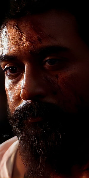 Suriya Sivakumar Intense Close-Up Portrait with Bloodied Face and Long Beard HD phone wallpaper