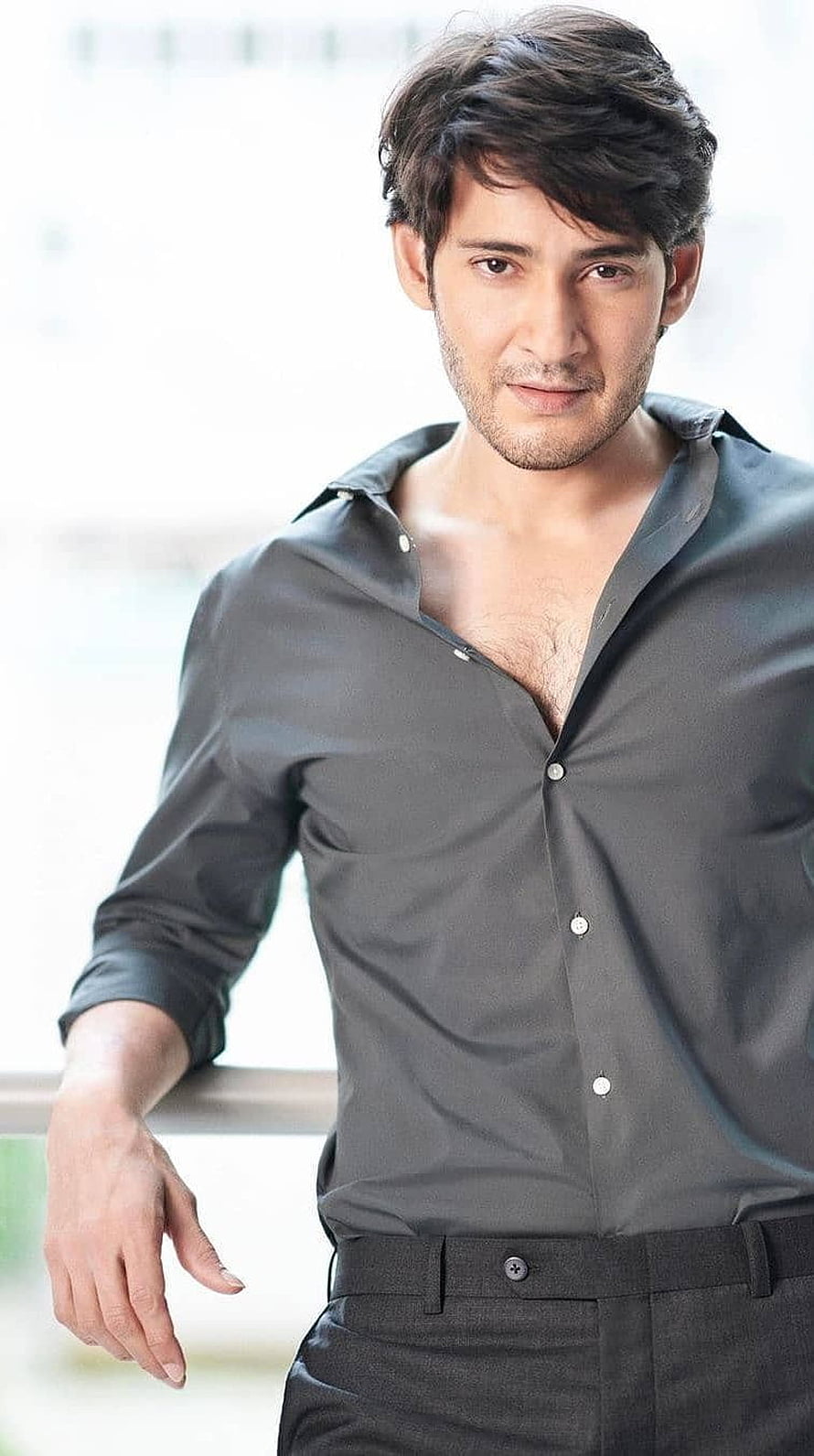 Mahesh Babu in a dark grey open-collar shirt with a confident studio portrait HD phone wallpaper