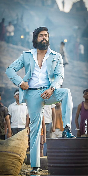 Yash in KGF Character Wearing Light Blue Suit with Beard and Confident Pose HD phone wallpaper