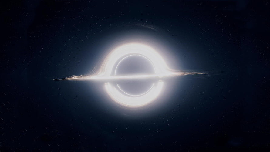 Interstellar Gargantua Black Hole with Glowing Accretion Disk in Deep Space HD wallpaper
