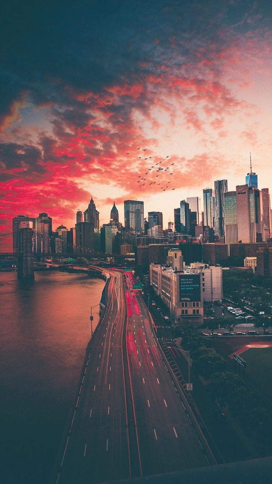 New York City Skyline at Sunset with FDR Drive and Manhattan Skyline HD phone wallpaper