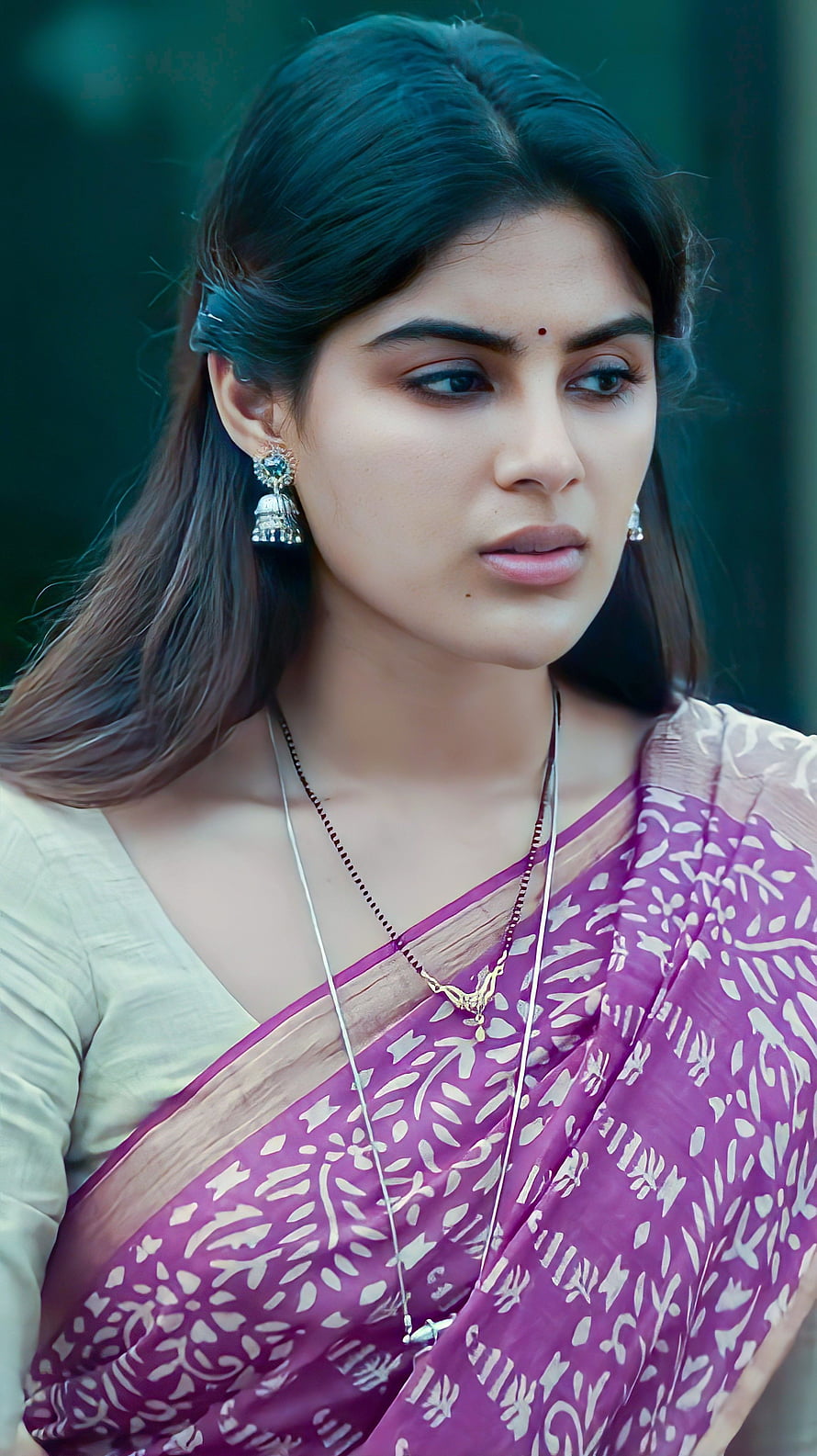 Samyukta Menon in a Purple Saree with Traditional Jewelry and Pensive Expression HD phone wallpaper