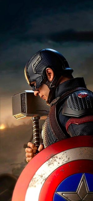 Captain America Holding Mjolnir and Shield in Dramatic Cinematic Profile HD phone wallpaper