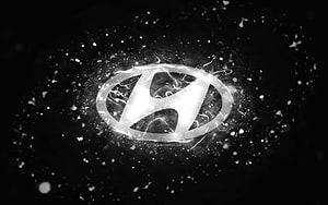 Glowing Hyundai Emblem With Electric Sparks On Black Background HD wallpaper