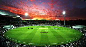 Adelaide Oval Cricket Stadium Under Dramatic Sunset Sky HD wallpaper