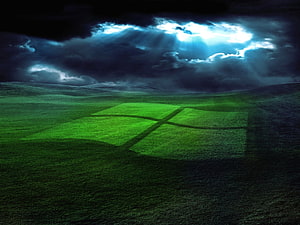 Windows XP Bliss Landscape with Dramatic Stormy Sky and Sunbeams HD wallpaper