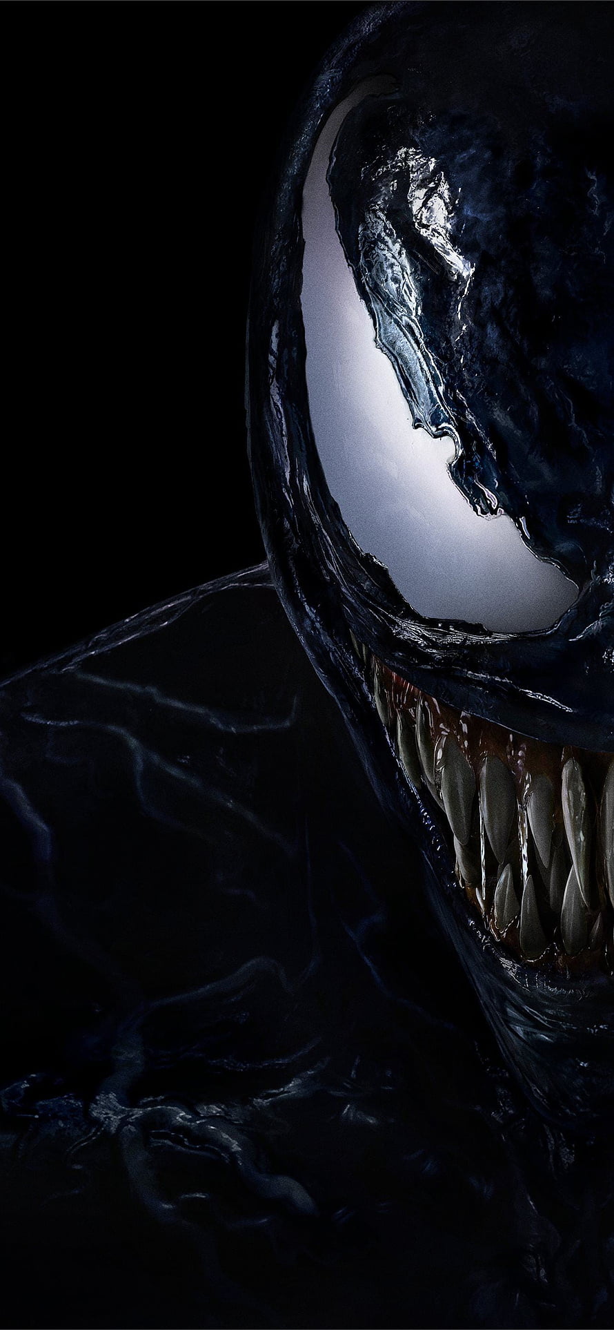 Venom Close-Up Portrait with Glowing Eyes and Sharp Teeth on Black Background HD phone wallpaper