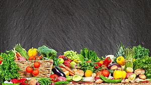 Colorful Fresh Vegetables And Fruits Arranged On Dark Slate Background HD wallpaper