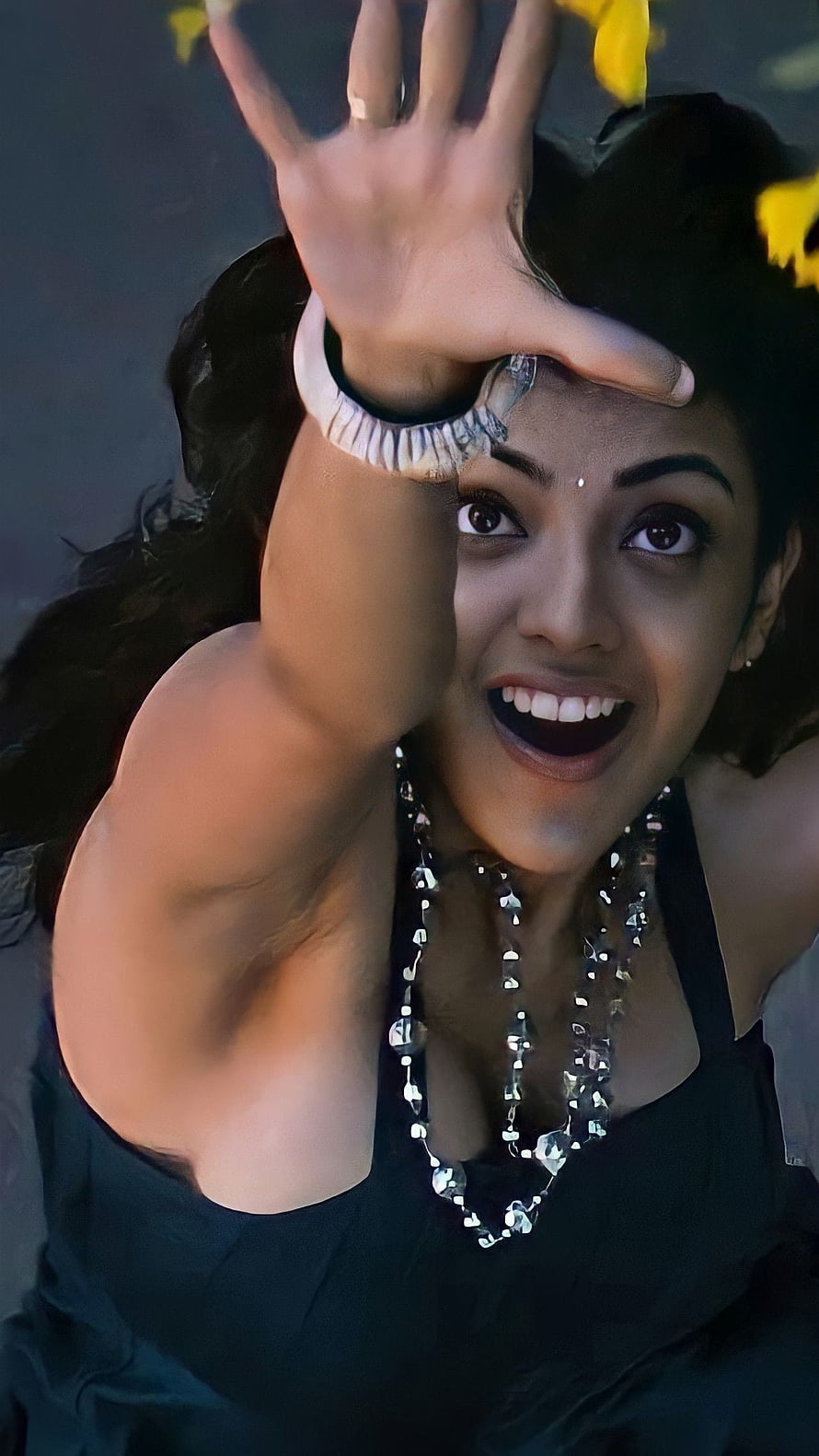 Kajal Agarwal in Maghadeera with expressive pose and traditional jewelry HD phone wallpaper