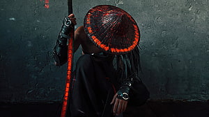Dark Samurai Warrior Crouching with Glowing Red Hat and Staff HD wallpaper