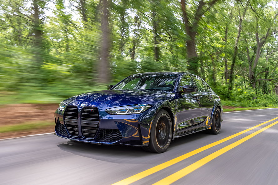Blue BMW M3 Competition G80 Sedan Driving on a Forest Road HD wallpaper