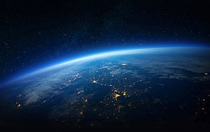 Earth at Night Viewed From Orbit With City Lights and Starry Sky HD wallpaper